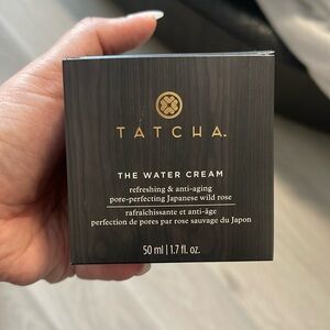 Tacha water cream. 1.7 fm. Brand new in the box. Never opened or used.